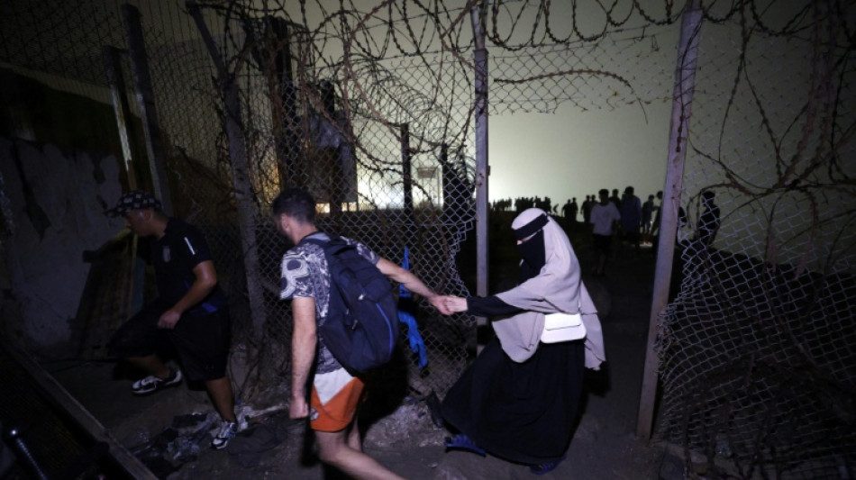 Migrants depart Spain's N. Africa enclave as EU tightens borders