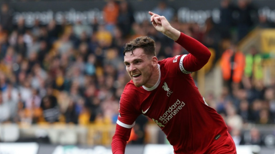 Liverpool beat Wolves 3-1 to top Premier League table