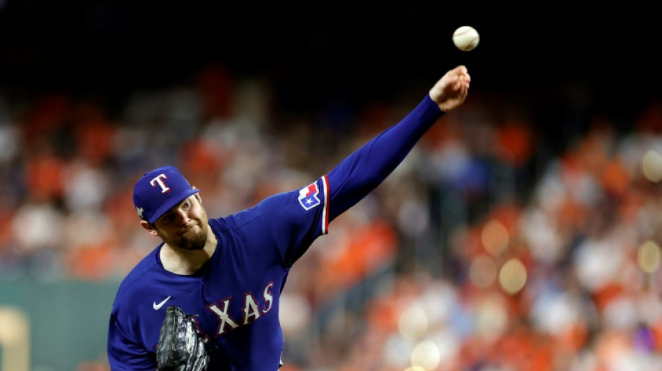Rangers blank defending champion Astros in MLB playoffs