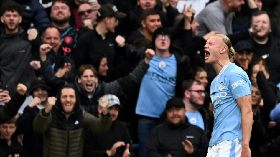 Man City return to Premier League summit after Liverpool win derby