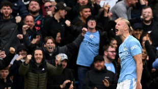 Man City return to Premier League summit after Liverpool win derby