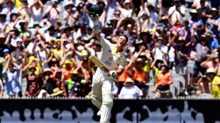 Australia's Warner not out 135 in 100th Test as South Africa struggle