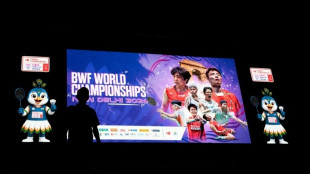 Number one Shi suffers shock first-round exit at badminton worlds