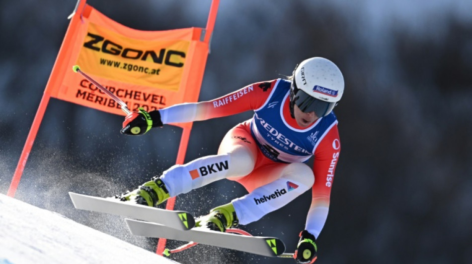 Flury upstages favourites to win 'unreal' world downhill gold