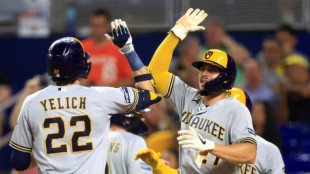 Brewers ride 12-run inning to victory, punch MLB playoff ticket