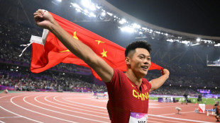 Double happiness for China as North Korean lifters smash records