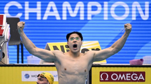 Breaststroke sensation Qin leads China swimming charge at Asian Games