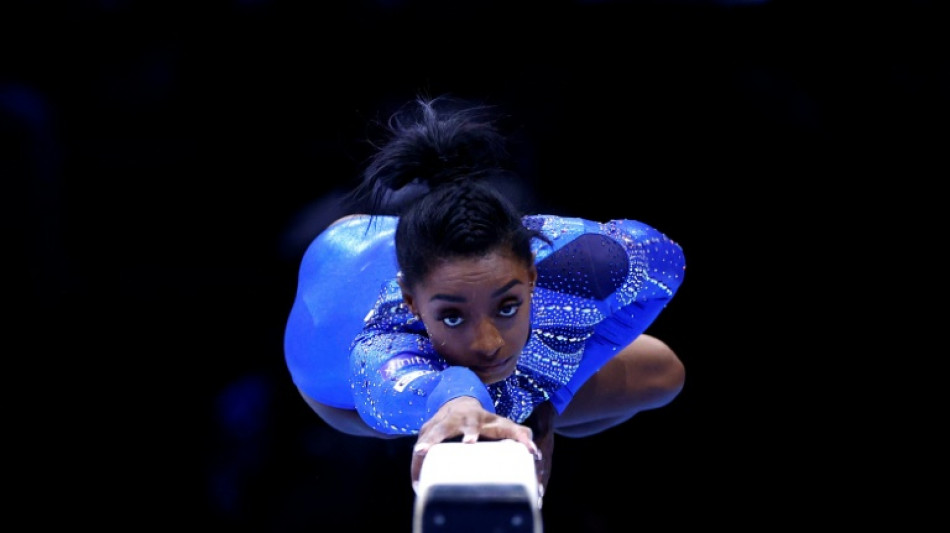 Biles wins 21st world title with all-around gymnastics gold