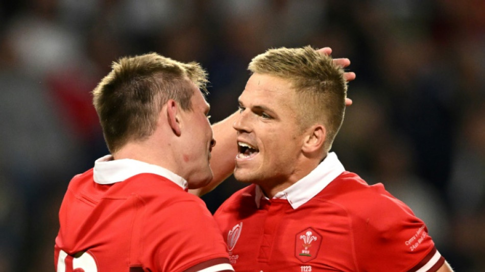 Wales blow away Wallabies to reach World Cup last eight, Scots win