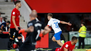 Youngster Lopez rescues Barca draw at Mallorca