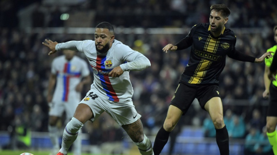 Depay joins Atletico Madrid from Barcelona
