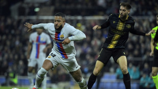 Depay joins Atletico Madrid from Barcelona