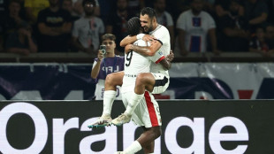 Mbappe scores twice but PSG slump to first defeat of season 