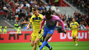 Leao fires Milan past Verona and level with leaders Inter