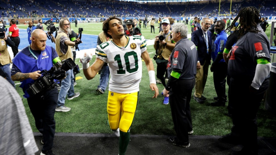 Love tames the Lions in Packers upset win