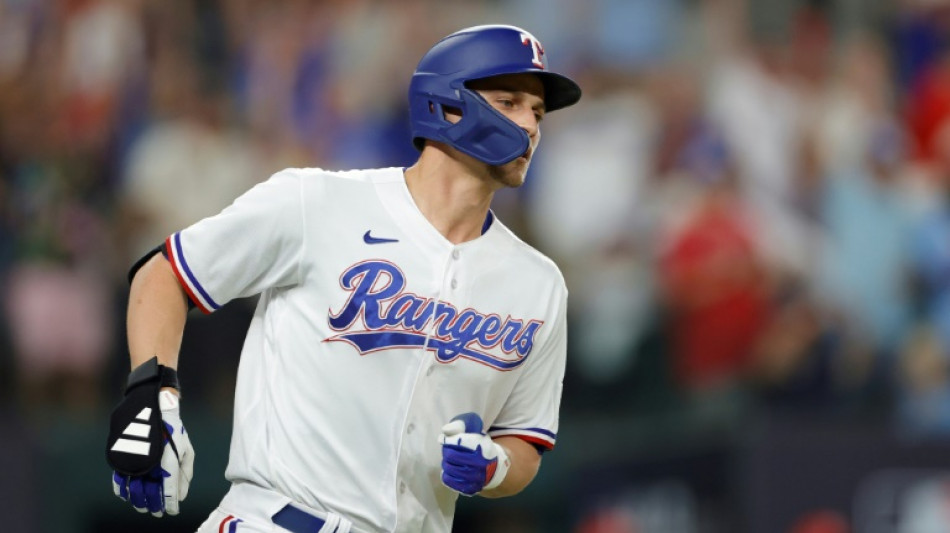 Rangers sweep Orioles to advance, Astros rout Twins