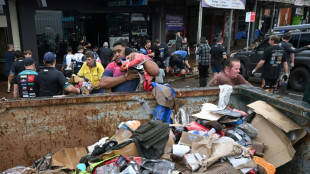 Bewohner kehren in von Überschwemmungen verwüstete Orte in Australien zurück