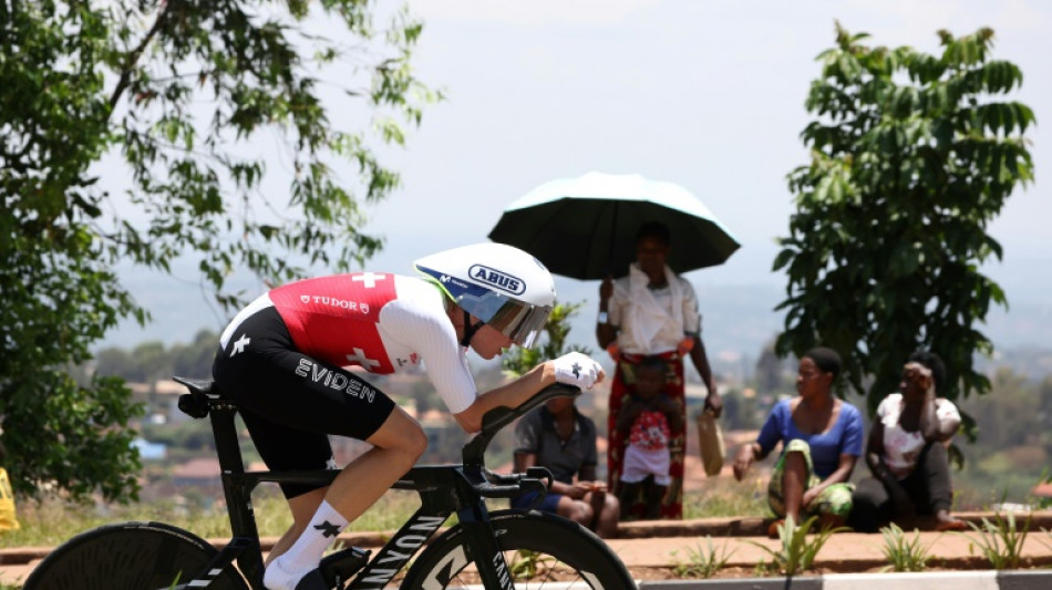 Reusser ends long chase for gold with women's world title 