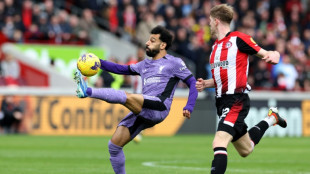 Salah scores in Liverpool return as Arsenal keep pressure on leaders