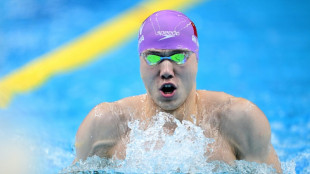 China in control as backstroke king Qin sets new Asian Games mark