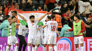 Debutants Tajikistan reach Asian Cup knockouts, China on brink