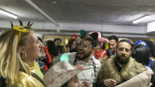 Au niveau moins quatre d'un parking de Tel-Aviv, la f&ecirc;te juive de Pourim en temps de guerre