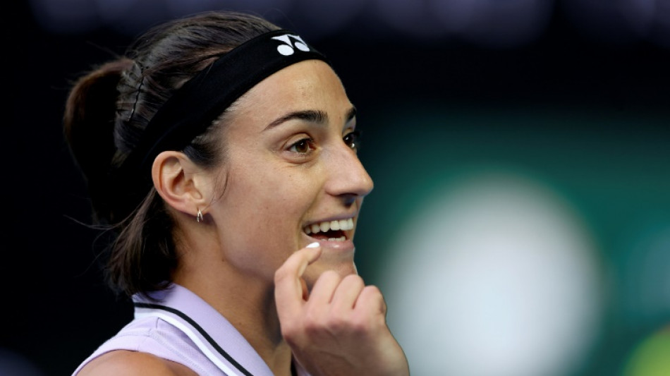 Garcia relieved to battle into Australian Open third round