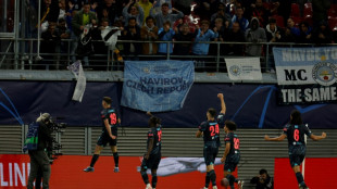 Alvarez and Doku strike late to push City past Leipzig