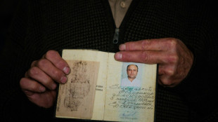 En un pueblo liberado de Ucrania, la importancia de llamarse Volodimir Zelenski