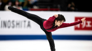 Uno overcomes injury to take lead at skating worlds