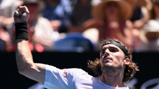 Tsitsipas says 'no presents' after ploughing on at Australian Open 