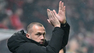 Ajax seek new coach after releasing Heitinga