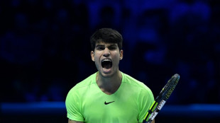 Alcaraz beats troubled Rublev to keep ATP Finals hopes alive