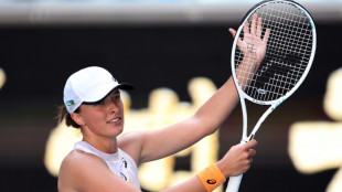 Ruthless Swiatek leads charge into Australian Open last 16