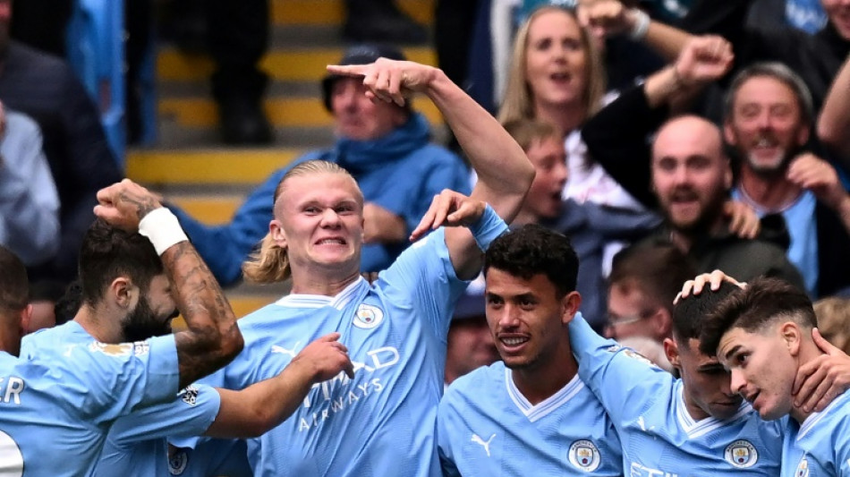Ten-man Man City show silk and steel to extend Premier League lead