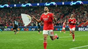 Benfica reach Champions League quarters by thrashing Brugge