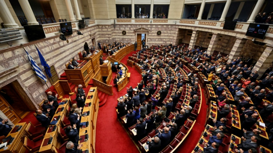 Greek government shrugs off wiretap scandal vote
