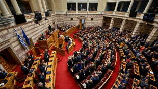 Greek government shrugs off wiretap scandal vote