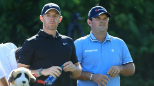 McIlroy plays down storm in a 'tee' cup with Reed