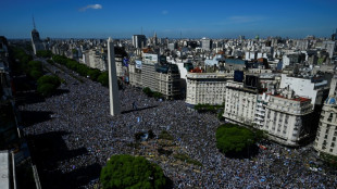 World Cup winners begin victory parade among euphoric Argentines