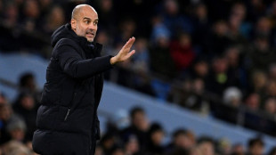 Guardiola says City must dig deep to catch hungry Arsenal