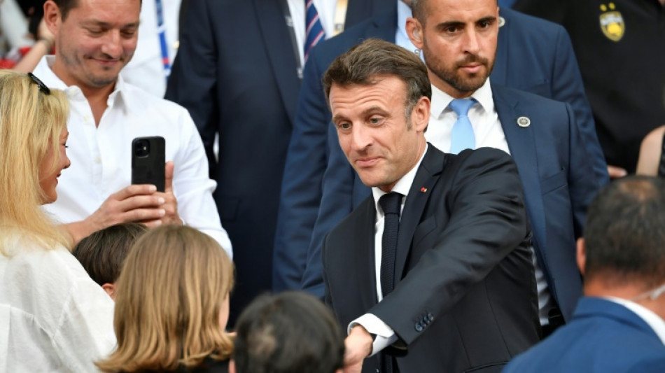 Lager-than-life president: Macron downs a beer to cheers, and criticism