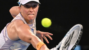 Swiatek looks for missing spark after surviving Australian Open test