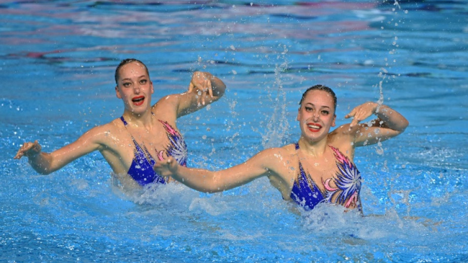 Ukrainian swimming sisters cling to Olympic hopes