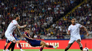 Sergio Ramos own goal helps Barca beat Sevilla