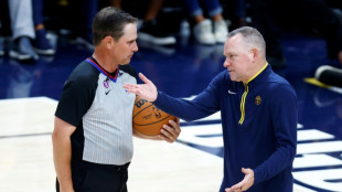Nuggets coach Malone completes journey to NBA title