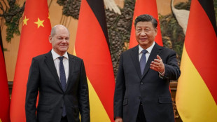 El jefe del gobierno alem&aacute;n aboga por un acercamiento en su controvertida visita a China