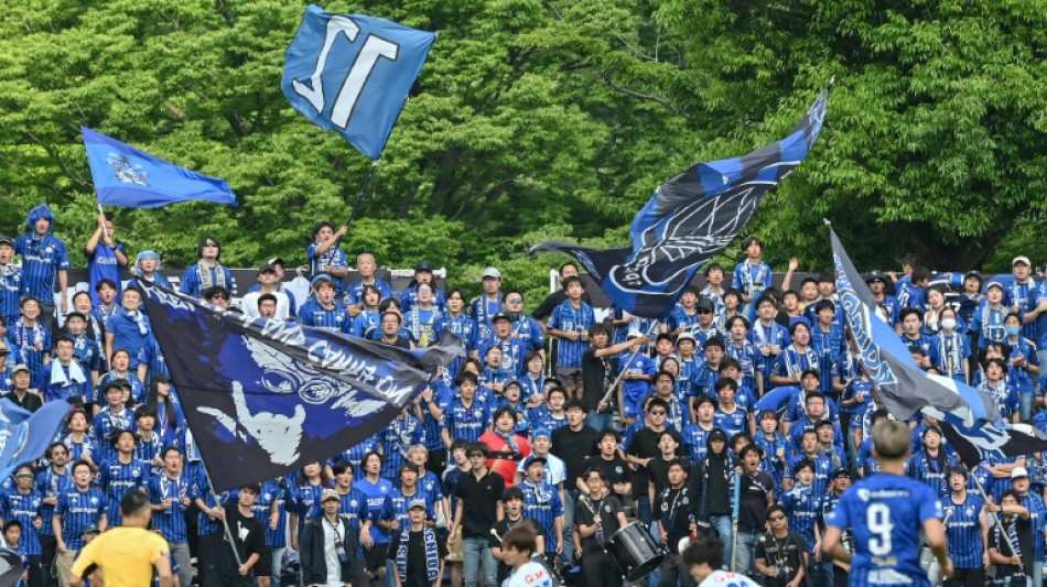 Japanese team with school coach to cap remarkable journey to the top
