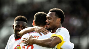 Openda's five-minute hat-trick lifts Lens to third