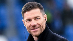 Liverpool target Xabi Alonso says staying as Leverkusen coach